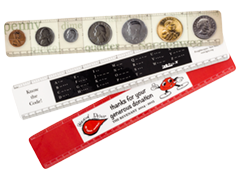 Three custom plastic rulers with coins, morse code and company logo